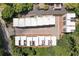 Aerial view showcases the community's well-maintained roofs, landscaping, and strategic parking at 717 Lenox Ln, Atlanta, GA 30324