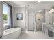 Bathroom with a soaking tub, separate shower, and a large window at 717 Lenox Ln, Atlanta, GA 30324