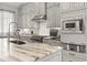 Spacious kitchen features granite countertops, stainless appliances, and shaker-style cabinets at 717 Lenox Ln, Atlanta, GA 30324