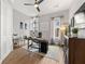 Home office featuring hardwood floors, a modern desk setup, and plenty of natural light, creating a productive workspace at 717 Lenox Ln, Atlanta, GA 30324