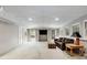 Spacious finished basement with ample light, plush carpet, and comfortable seating at 820 Chelsea Park Ne Dr, Marietta, GA 30068