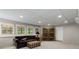 Bright finished basement featuring plush carpet, lots of natural light, and cozy seating at 820 Chelsea Park Ne Dr, Marietta, GA 30068