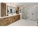 Beautiful bathroom with white marble floors, a spacious shower, and wood-grained vanity at 820 Chelsea Park Ne Dr, Marietta, GA 30068
