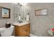 Powder bath featuring gray walls, updated vanity and elegant decorative art at 820 Chelsea Park Ne Dr, Marietta, GA 30068