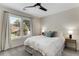 Bright bedroom with a large window, shutters, and a comfortable bed at 820 Chelsea Park Ne Dr, Marietta, GA 30068