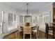 Charming breakfast nook with abundant natural light and a stylish chandelier at 820 Chelsea Park Ne Dr, Marietta, GA 30068