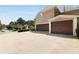 Attached two-car garage, additional one car garage, and large driveway at 820 Chelsea Park Ne Dr, Marietta, GA 30068