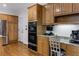 Well-appointed kitchen with oak cabinets, stainless steel appliances, and built in desk at 820 Chelsea Park Ne Dr, Marietta, GA 30068