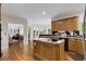 Open kitchen with stainless appliances and views to the patio, dining area and Gathering room at 820 Chelsea Park Ne Dr, Marietta, GA 30068