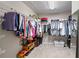 Well-organized walk-in closet featuring shelving, hanging rods, and ample storage space at 11352 Musette Cir, Alpharetta, GA 30009