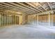 Unfinished basement with exposed framing, ready for customization and expansion at 146 Silver Leaf Trce, Douglasville, GA 30134
