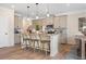 Kitchen with kitchen island and bar stools at 146 Silver Leaf Trce, Douglasville, GA 30134