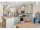 Modern eat-in kitchen with an island, stainless steel appliances, granite countertops and eat-in breakfast nook at 146 Silver Leaf Trce, Douglasville, GA 30134
