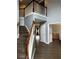 Grand foyer with high ceilings, elegant staircase, and beautiful hardwood floors provides a welcoming entrance at 1498 Park Knoll Trl, Lawrenceville, GA 30043