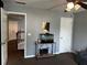 Hallway featuring an aquarium, stairs and three doorways at 1498 Park Knoll Trl, Lawrenceville, GA 30043