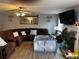 Bright living room features hardwood floors and comfortable seating at 1498 Park Knoll Trl, Lawrenceville, GA 30043