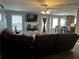 Open concept living room offers hardwood floors and flows into the kitchen at 1498 Park Knoll Trl, Lawrenceville, GA 30043