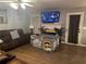 Cozy living room features hardwood floors and comfortable seating at 1498 Park Knoll Trl, Lawrenceville, GA 30043