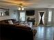 Cozy living room with hardwood floors and comfortable seating at 1498 Park Knoll Trl, Lawrenceville, GA 30043