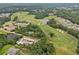 Aerial view featuring a golf course and a pond at 406 Horizon Trl, Canton, GA 30114