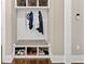 Hallway with built-in storage, bench seating and coat hooks at 406 Horizon Trl, Canton, GA 30114