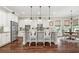 Bright kitchen with a large island, stainless steel appliances, and an adjacent breakfast nook at 406 Horizon Trl, Canton, GA 30114