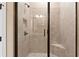 Stylish walk-in shower with glass door and built-in seat at 406 Horizon Trl, Canton, GA 30114