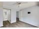 Bedroom featuring wood floors, a ceiling fan, and two entryways at 795 Hammond Dr # 503, Sandy Springs, GA 30328