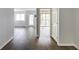 The living space showcases new hardwood floors, fresh paint, and access to a private outdoor balcony at 795 Hammond Dr # 503, Sandy Springs, GA 30328