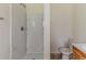 Bright bathroom featuring a standing shower and a modern toilet and sink combination at 1006 Eagle Vw, Lawrenceville, GA 30044