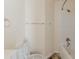 Clean bathroom featuring a shower-tub combo and a toilet at 1006 Eagle Vw, Lawrenceville, GA 30044