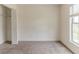 Bedroom featuring a closet and a window providing natural light at 1006 Eagle Vw, Lawrenceville, GA 30044