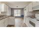Bright, spacious kitchen with modern appliances, and direct access to dining area at 1006 Eagle Vw, Lawrenceville, GA 30044