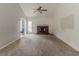Cozy living room with a brick fireplace and vaulted ceilings, creating a warm and inviting atmosphere at 1006 Eagle Vw, Lawrenceville, GA 30044