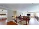 Spacious bonus room featuring hardwood floors, natural light, and a view into the bedroom at 2458 Brook Park Trl, Snellville, GA 30078