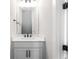 Modern bathroom with white vanity, sleek fixtures, and contemporary design at 2461 Sycamore Nw Rd, Atlanta, GA 30318