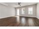 Bright bedroom with multiple windows, ceiling fan, and modern flooring, creating a comfortable retreat at 2461 Sycamore Nw Rd, Atlanta, GA 30318