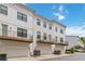 Townhomes with balconies over garages, designed for modern living and maximizing space and outdoor enjoyment at 2461 Sycamore Nw Rd, Atlanta, GA 30318