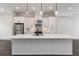Stylish kitchen with a large island, stainless steel appliances, and pendant lighting at 2461 Sycamore Nw Rd, Atlanta, GA 30318