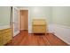 Bedroom with hardwood flooring, wainscoting and french doors at 2790 Laurel Ridge Dr, Decatur, GA 30033