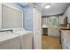 Convenient laundry area with modern washer and dryer adjacent to the kitchen at 2790 Laurel Ridge Dr, Decatur, GA 30033