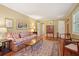 Elegant living room showcasing hardwood floors, stylish decor, and multiple access points for seamless flow at 2790 Laurel Ridge Dr, Decatur, GA 30033