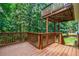 Back deck overlooking a lush, wooded backyard at 327 Red Fox Dr, Canton, GA 30114