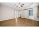 Open and spacious main bedroom with wood floors, access to ensuite, and closet at 327 Red Fox Dr, Canton, GA 30114