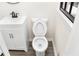 Bathroom features a new toilet, vanity, and window bringing in natural light at 3530 Turner Heights Dr, Decatur, GA 30032