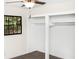 Bright bedroom with window and double closet with shelving ready for storage solutions at 3530 Turner Heights Dr, Decatur, GA 30032