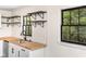 Kitchen featuring butcher block countertops, sleek hardware and open shelving at 3530 Turner Heights Dr, Decatur, GA 30032