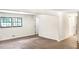 Bright living room with wood-look flooring and views of the outdoors at 3530 Turner Heights Dr, Decatur, GA 30032