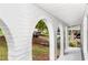 Spacious covered porch area with white brick arches, perfect for outdoor seating at 3530 Turner Heights Dr, Decatur, GA 30032