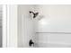 Shower features white subway tile and a dark, modern shower head and handle at 3530 Turner Heights Dr, Decatur, GA 30032